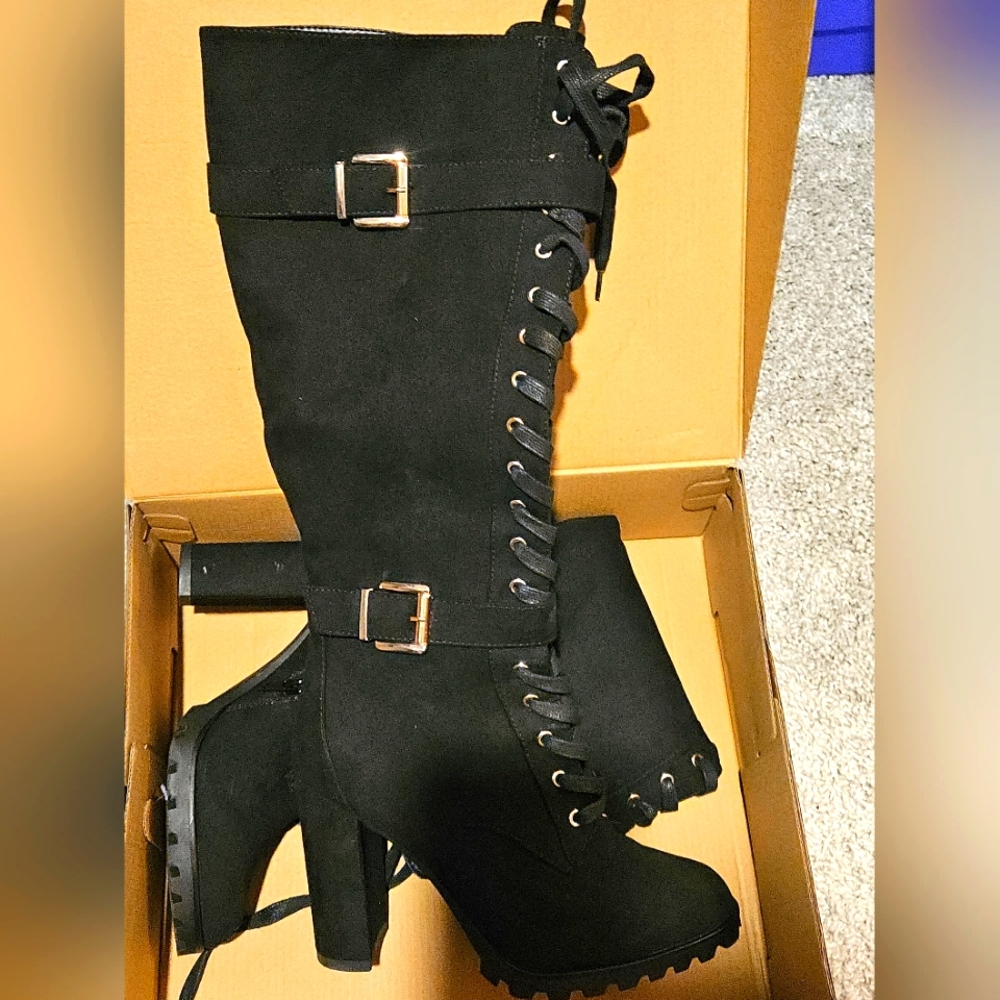 Black knee high boot